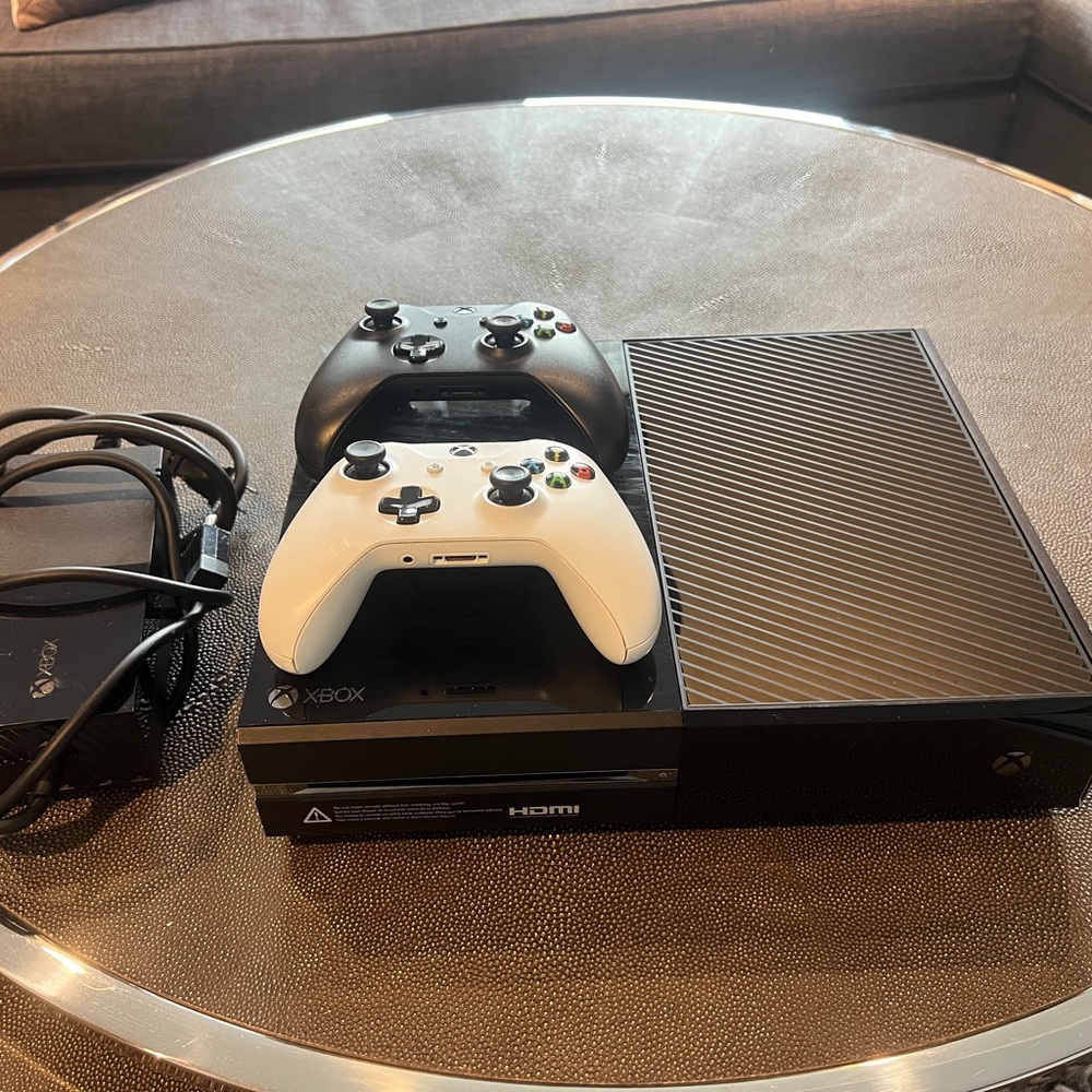 Console with Black and White Controllers